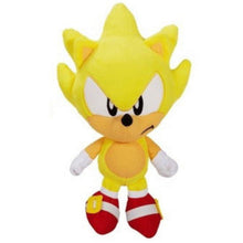 Yellow Sonic-style plush doll facing camera, red-and-white striped shoes and gloves