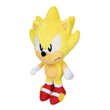 Yellow Sonic-style plush doll in side view with red-and-white striped legs and shoes