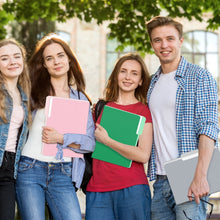 Students holding pastel file folders with 1/3 cut tabs outdoors