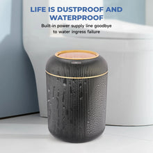 Black automatic trash can with ridged texture and closed touchless lid