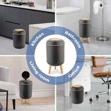 Black automatic trash can with ridged body and warm rim closed lid