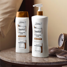Two lotion pump bottles on a countertop, white with brown dispensers