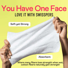 Folded white disposable cotton face wipe held between hands