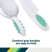 Comfort grip baby brush and comb handles with teal textured pads, white plastic