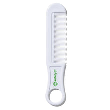 Infant grooming brush with white handle and fine bristle teeth