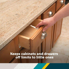 White cabinet drawer latch installed inside drawer opening, toddler safety