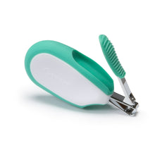 Seafoam-handled nail clipper with a matching comb-style brush.
