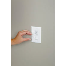 Cabinet latch being placed on cabinet handle for child safety