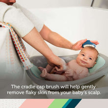 Teal cradle cap brush on baby scalp