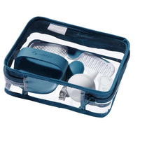 Teal zippered grooming kit case open, showing brush, comb, and grooming tools
