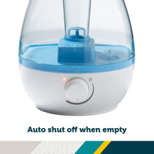 Front view of white and blue cool mist humidifier with illuminated power button