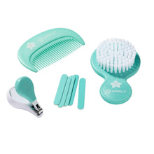 Teal grooming accessories: brush, comb, nail clippers, and emery boards