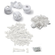 White childproofing kit parts laid out, including plug protectors and latch bars