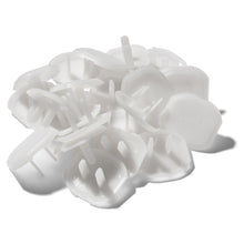 White molded childproofing covers and hardware pieces in a pile