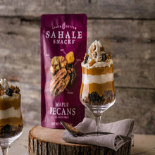 Maple pecans glazed snack mix bag with a layered sundae glass and nut snacks