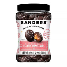 Jar of dark chocolate sea salt caramel eggs with white sprinkles