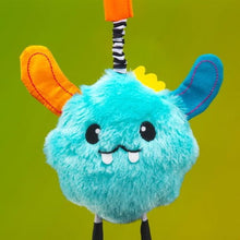 Plush blue Yeti face with orange ear and striped hanging attachment strap