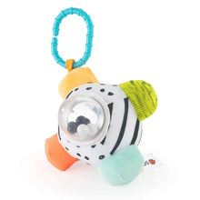 Plush sensory rattle ball with zebra-striped fabric, teething ring handle, and crinkle beads