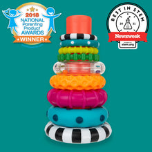 Stacking ring toy with stacked orange, pink, teal, yellow, green, and striped rings