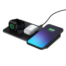 Satechi wireless charging dock with black pad, smartwatch stand, earbuds and phone
