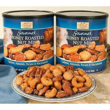 Two gourmet honey roasted nut mix canisters and bowl of roasted nuts
