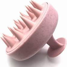 Pink scalp massager shampoo brush with soft bristles and curved grip