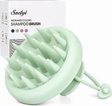 Mint green scalp massager shampoo brush with soft bristles and handle