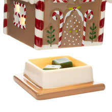Gingerbread-style ceramic wax warmer base with open tray holding green wax cubes