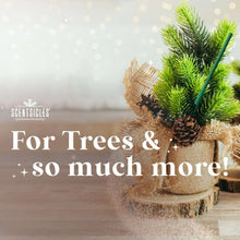 Green scented stick ornament stake among pine branches on a wood surface
