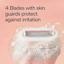 Razor head with 4 blades and skin guards, lather close-up