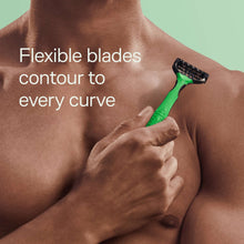 Green disposable razor held against a man's cheek for shaving