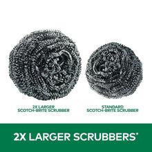 Two round stainless steel scrubber pads, dark gray-silver, tightly coiled.
