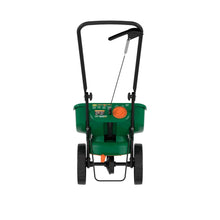 Front view green mini spreader with hopper and orange control dial