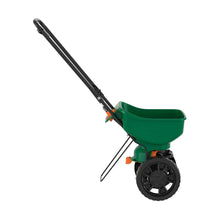 Green mini broadcast spreader with push handle and wheels