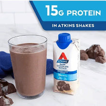 Atkins protein shake bottle and glass of dark chocolate drink