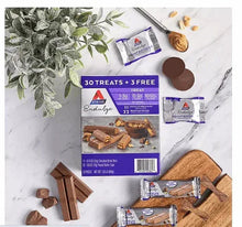 Endulge variety pack with chocolate break bars and peanut butter cups, snacks on boards