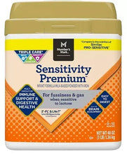 Baby formula canister with gold lid, orange label, Sensitivity Premium branding