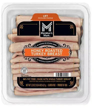 Honey roasted turkey breast deli slices in sealed tray with front package label