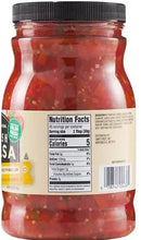 Glass jar of red salsa with black lid, back Nutrition Facts label.
