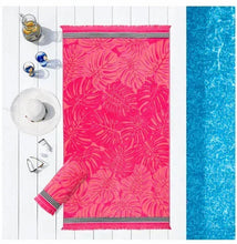 Beach towel set of two: pink leaf print with striped trim and blue towel.