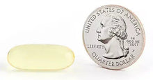 Omega-3 fish oil softgel beside a quarter-dollar coin for size