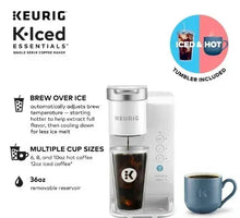 White Keurig K-Iced Essentials pod coffee maker with cup, blue tumbler, and control buttons