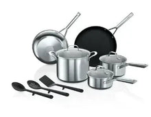 Stainless cookware set with black nonstick pans and matching lids plus utensil accessories