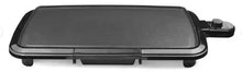 Black electric griddle with side temperature control knob