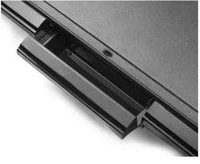 Electric griddle underside with removable drip tray and heating grooves