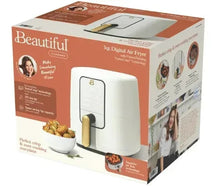 3 qt air fryer retail box, white with gold handle shown on air fryer