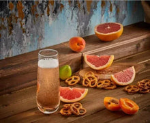 Stemless champagne flute, tall clear stemless glass with frosted base, filled with sparkling