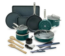 Teal non-stick cookware set with frying pans, lids, and utensils on tray