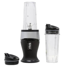 Personal blender base with two clear travel cups and black blending lid