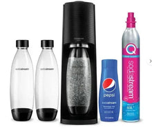 Black sparkling water maker with two white bottles and Pepsi 440 ml bottle
